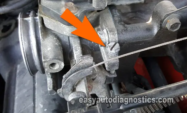 Location Of The Idle Stop Screw 1994-1995 3.8L Ford Mustang.