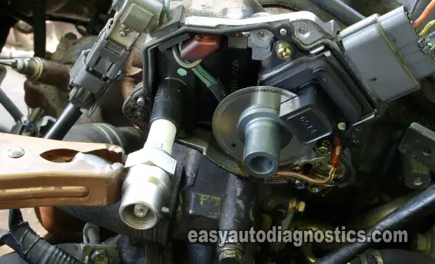 Checking For Spark Directly On The Ignition Coil Tower. How To Test The Ignition Coil 2.4L Nissan Altima (1997-2001)