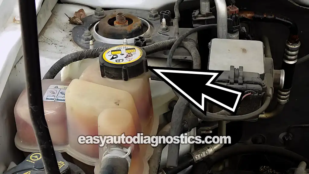 Coolant Shooting Out Of Radiator. How To Test For A Blown Head Gasket (2001, 2002, 2003, 2004 2.0L Ford Escape And Mazda Tribute)